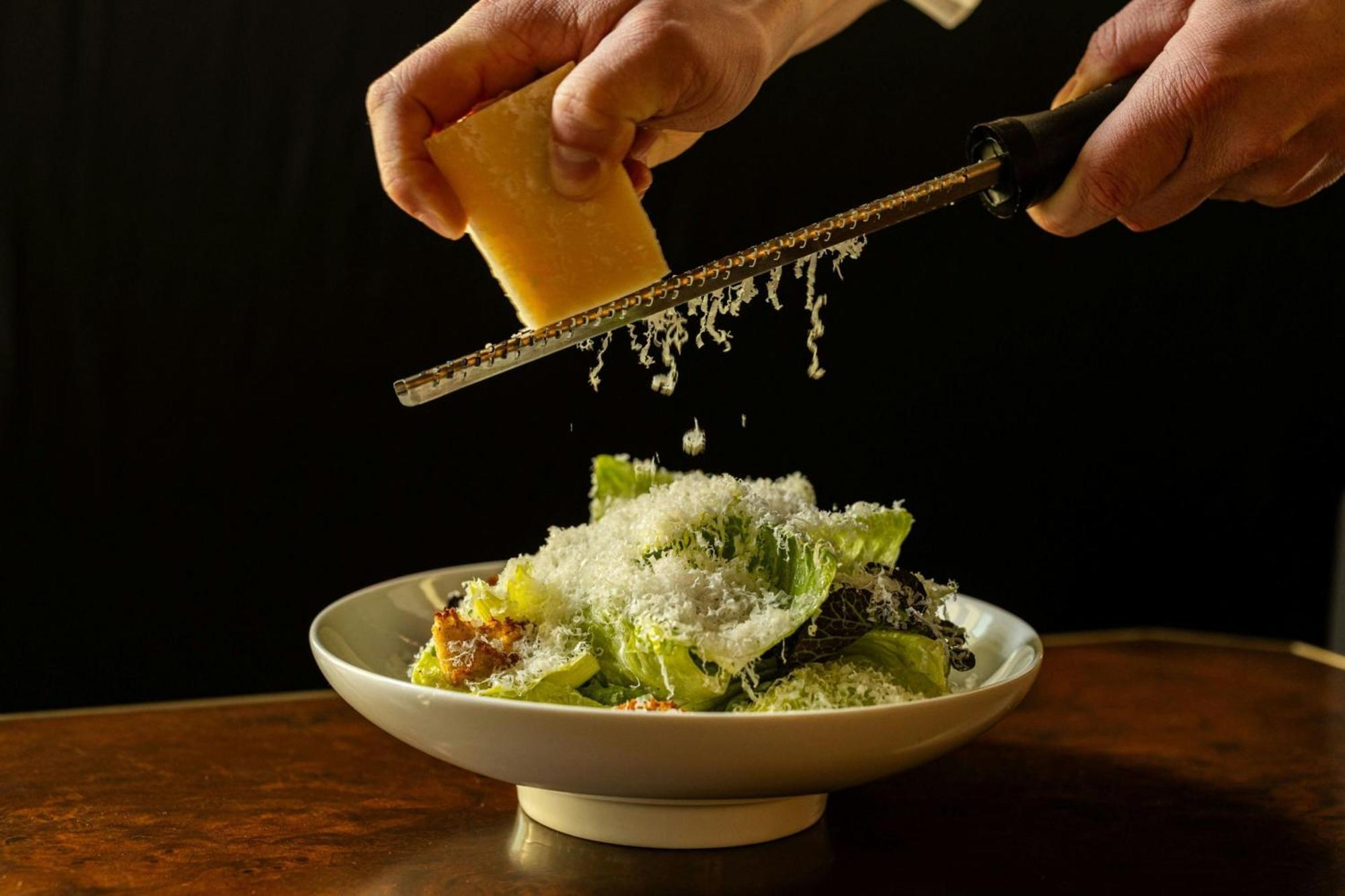 Hotel New York Marriott Marquis Exterior foto Parmesan cheese being grated over a salad